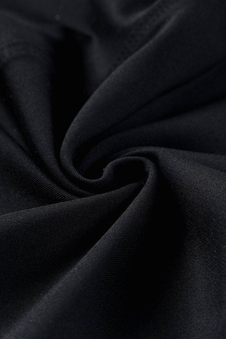 a close up view of a black fabric