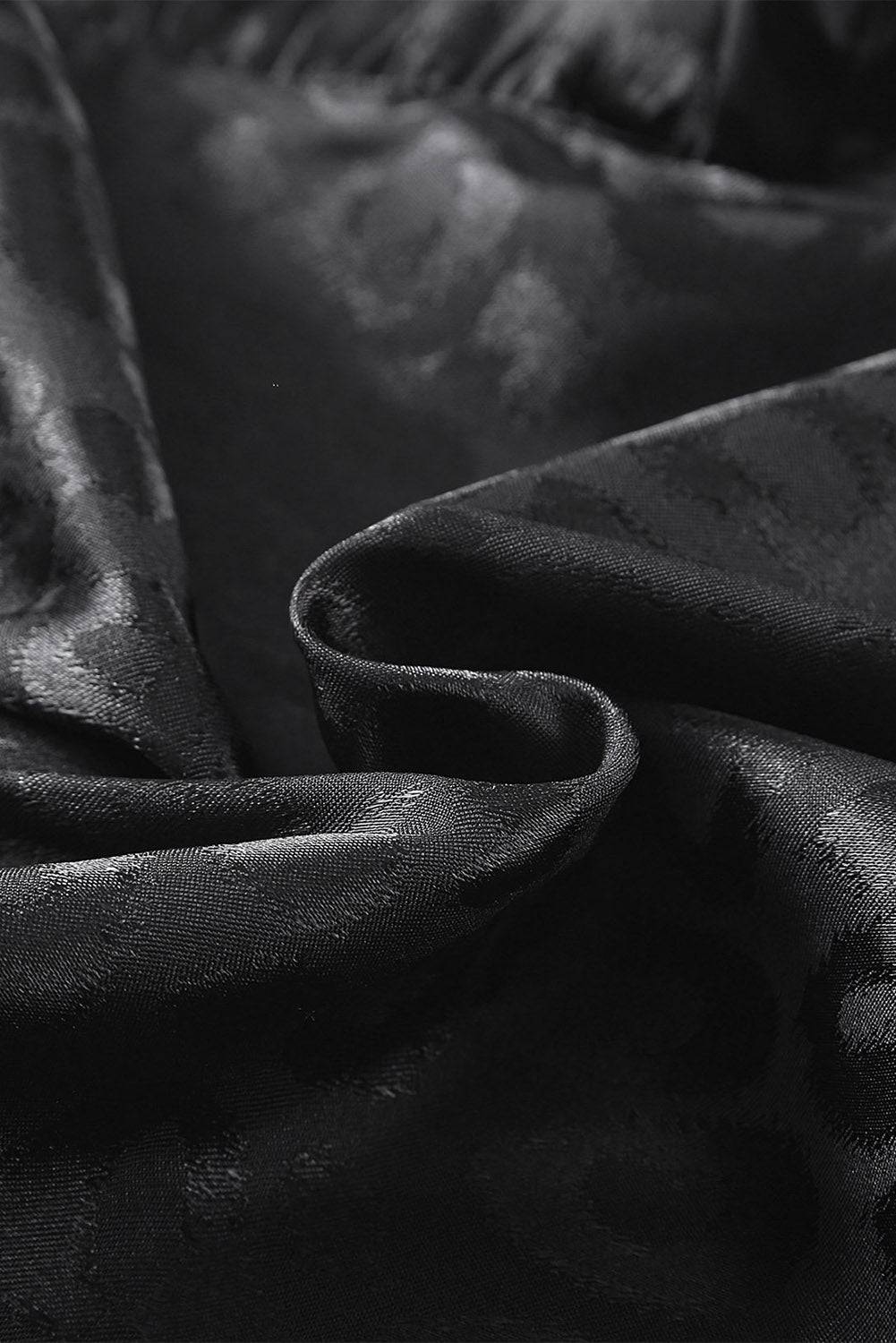 a black and white photo of a fabric