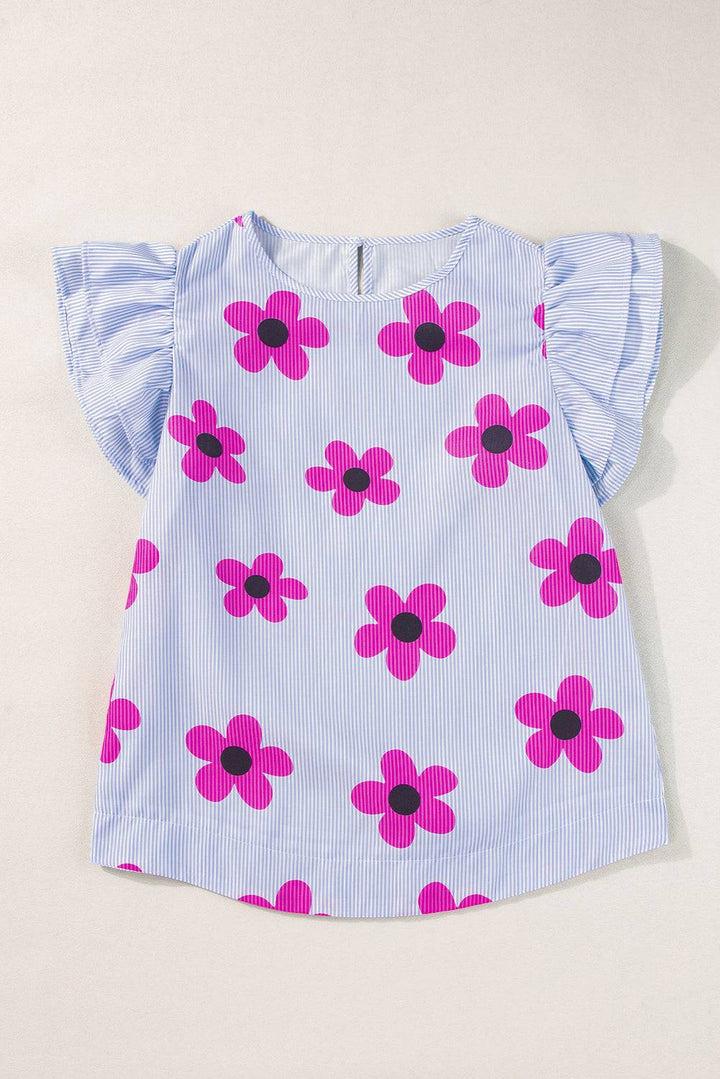 a blue and white shirt with pink flowers on it