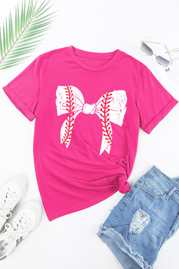 a t - shirt with a bow on it and a pair of shorts