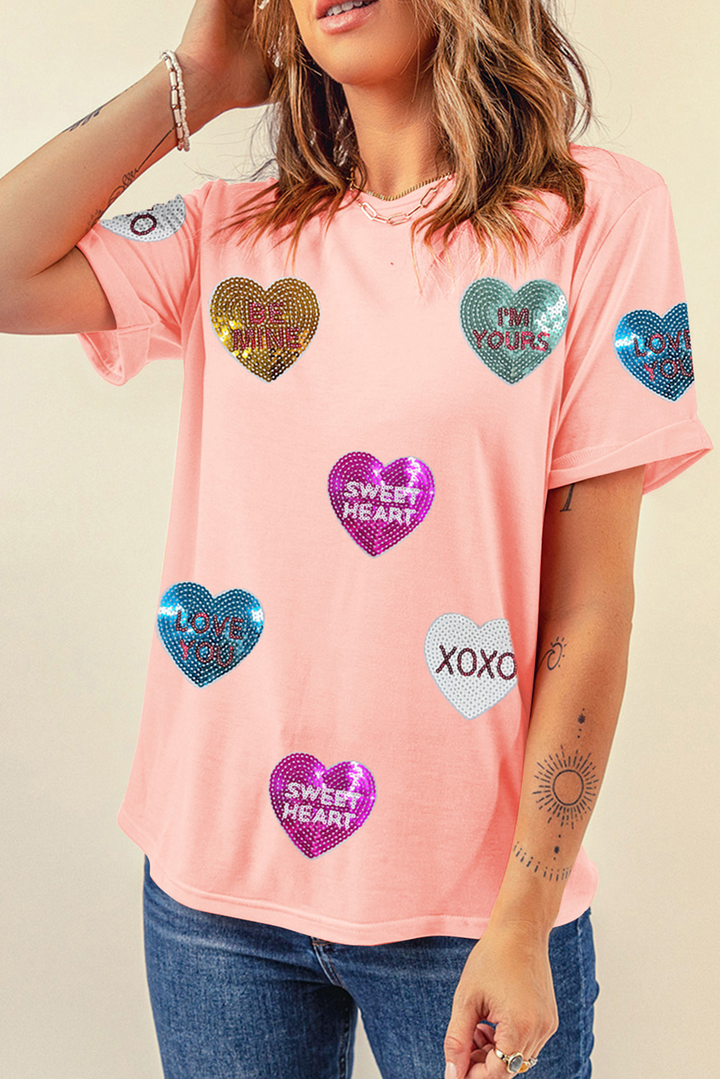 Casual look featuring the Pink Sequin Valentines Lettering Heart Patched Crewneck T Shirt with glittery heart patches and love-themed text. Shop now at Faith & Co. Boutique.