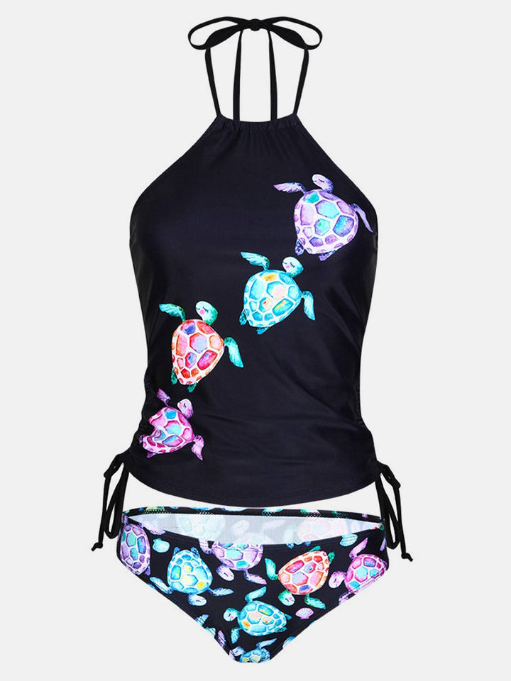 a women's swimsuit with turtles on it