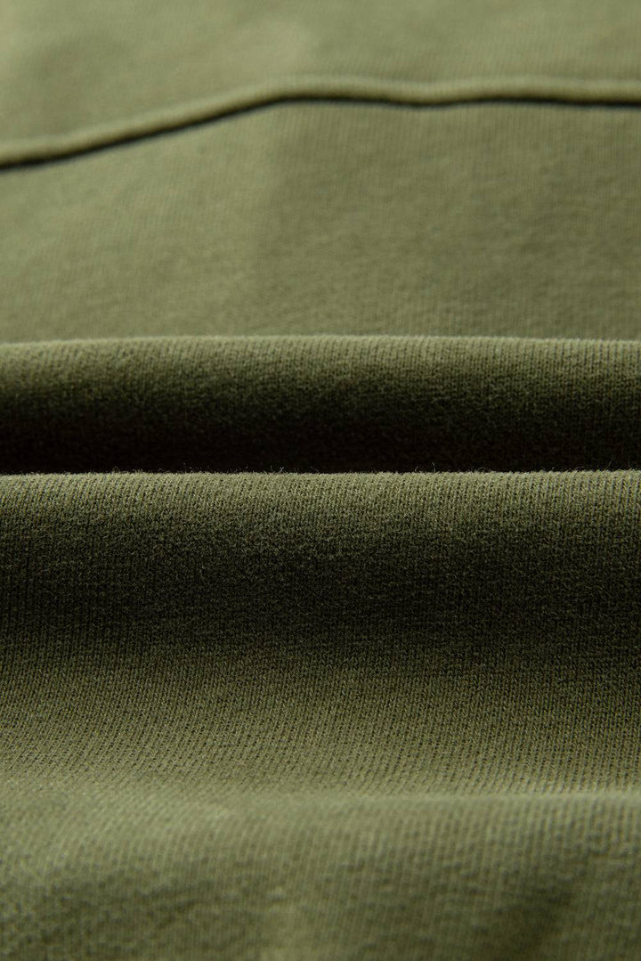 a close up view of a green fabric