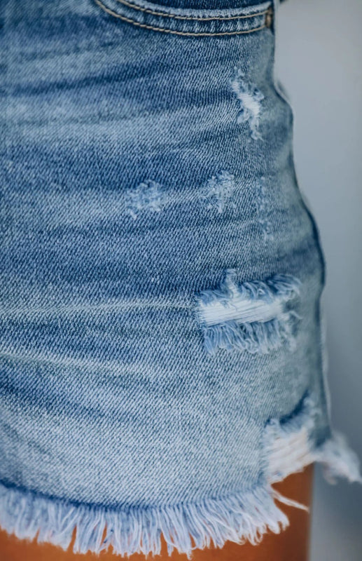 a close up of a woman's butt with a cell phone in her pocket