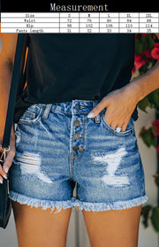 a woman wearing a black shirt and jean shorts