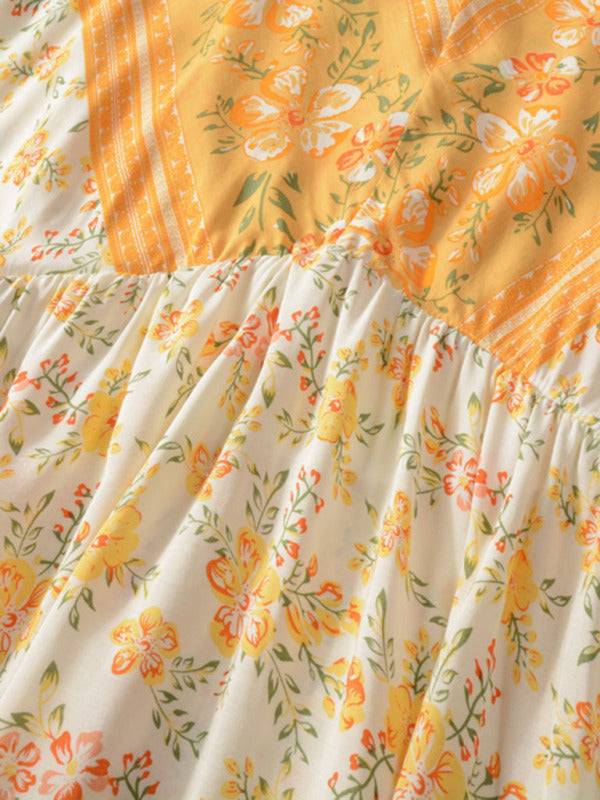 a close up of a dress with flowers on it