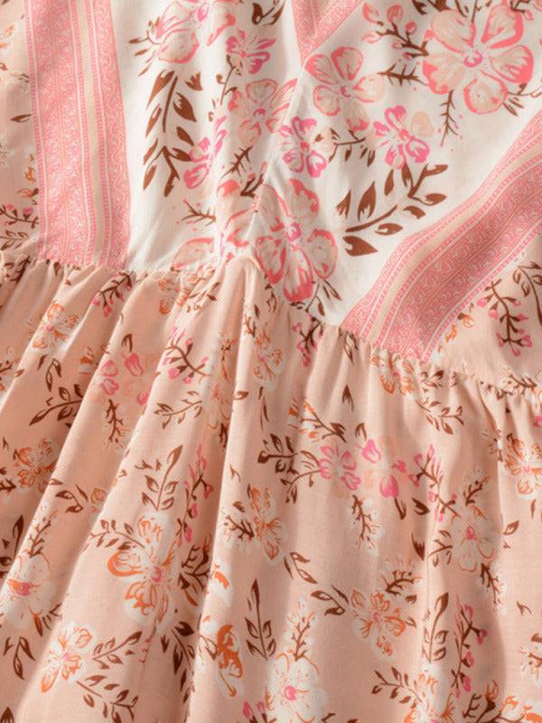a close up of a dress with a flower pattern