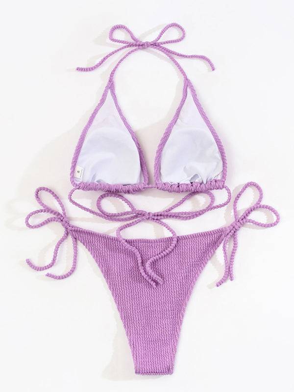a purple bikini top with a tie around the bottom