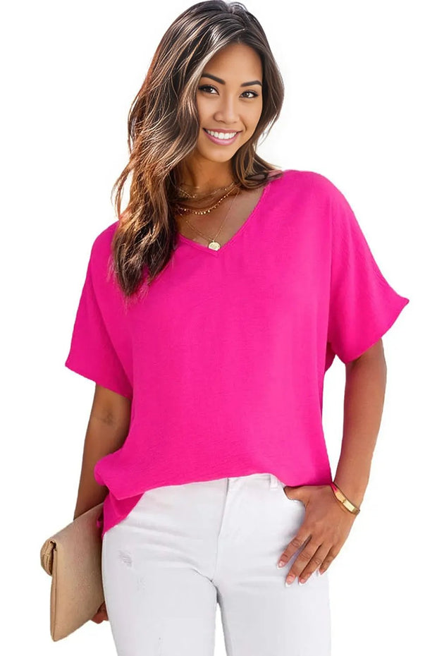Rose Solid V Neck Short Sleeve Blouse
This solid-color blouse is simple yet fashionable
V-neck, short sleeves, and shift cut make this blouse suitable for summer
This blouse is comfortable with soft andTops