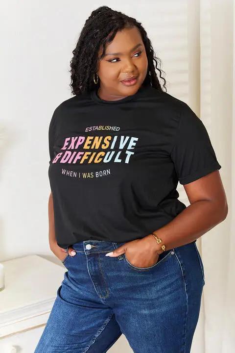a woman wearing a black t - shirt that says expensive difficult