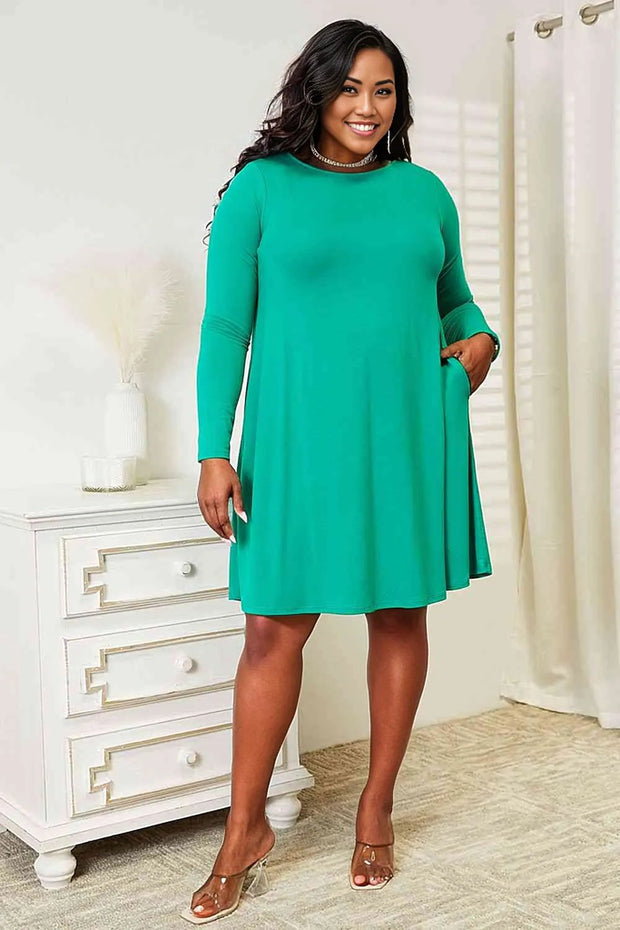 Zenana Full Size Long Sleeve Flare Dress with PocketsElevate your wardrobe with this dress, a perfect balance of style and convenience. The long sleeves provide a touch of elegance and warmth, making it suitable for vaDRESS