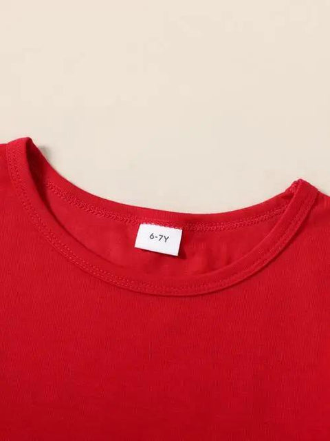 a red t - shirt with a tag on it