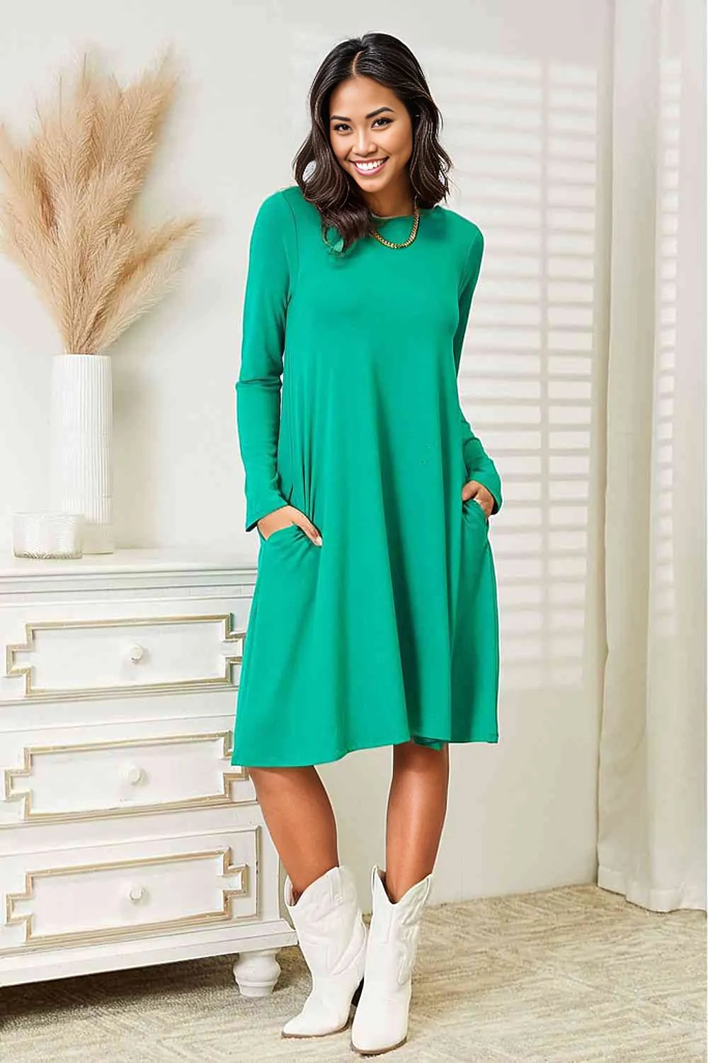 Zenana Full Size Long Sleeve Flare Dress with PocketsElevate your wardrobe with this dress, a perfect balance of style and convenience. The long sleeves provide a touch of elegance and warmth, making it suitable for vaDRESS