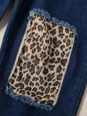 a leopard print pocket on a pair of jeans