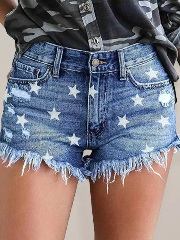 a woman wearing shorts with stars on them