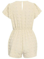 a women's short - sleeved rom playsuit with white flowers