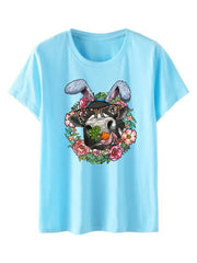 a blue t - shirt with an image of a dog wearing bunny ears