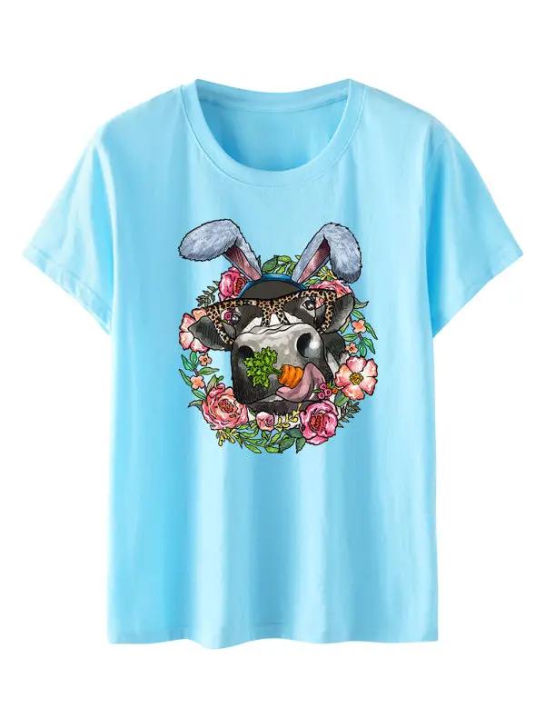 a blue t - shirt with an image of a dog wearing bunny ears