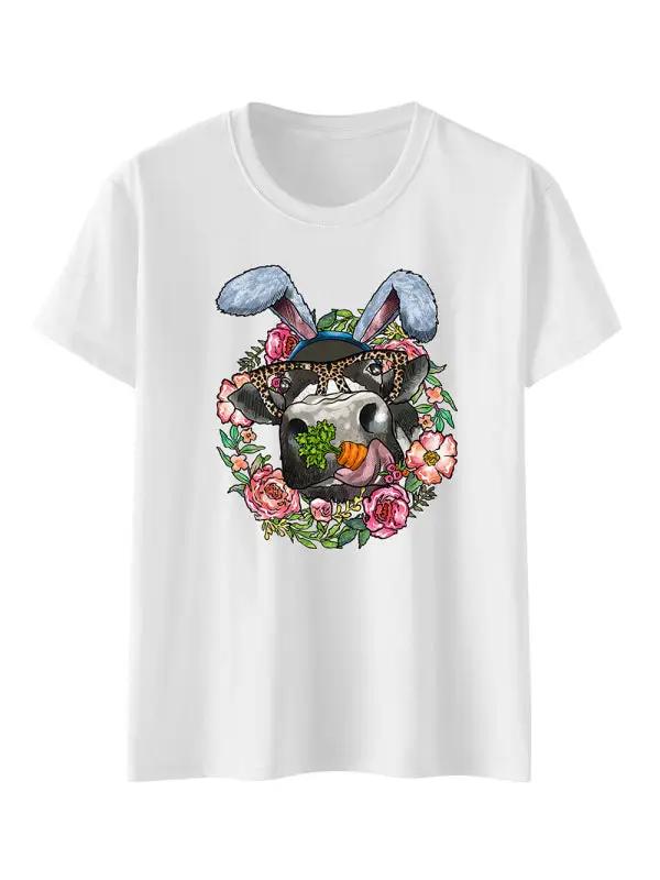a white t - shirt with an image of a dog wearing a hat
