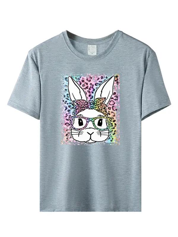a t - shirt with an image of a rabbit wearing glasses