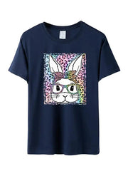 a t - shirt with an image of a rabbit wearing glasses