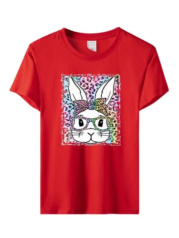 a red t - shirt with an image of a rabbit wearing glasses