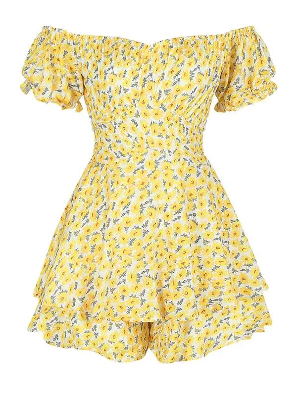 a yellow floral dress with ruffled sleeves