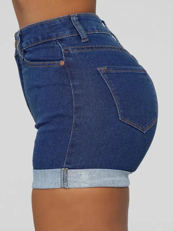 a woman's butt showing the bottom of her jean shorts