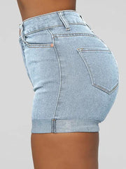 a woman's butt showing her jeans shorts