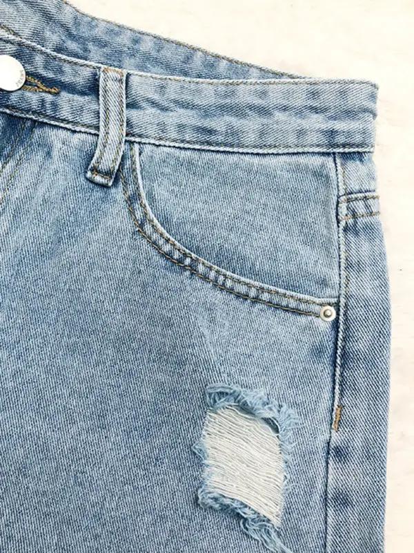 a pair of jeans with a hole in the side