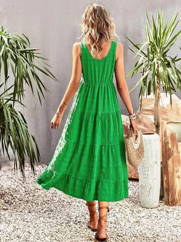 a woman in a green dress walking away from the camera