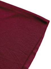 a close up of a red cloth on a white background