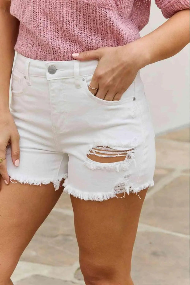 RISEN Lily High Waisted Distressed ShortsThese shorts are designed to give you a chic and edgy look while providing ultimate comfort and style. Crafted with precision and attention to detail, these shorts fCasual Shorts