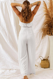 Tie-Waist Ruffled Strapless Wide Leg Jumpsuit
Pattern type: Solid
Style: Chic
Features: Ruffle, Tie, Pockets
Neckline: Straight
Length: Long
Sleeve length: Sleeveless
Sleeve type: Sleeveless
Material compositioJumpsuits & Rompers